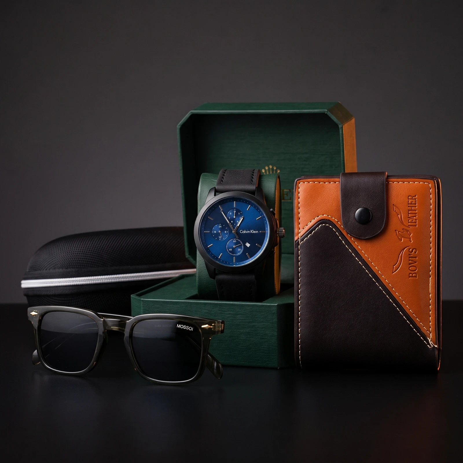 Pack Montre Homme Calvin Klein Noir & Bleu + Portefeuille Homme Vertical Noir & Marron + Lunettes de Soleil Olive Green